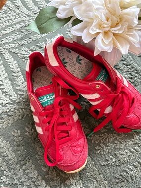 adidas women’s Red Sneakers with White Stripes